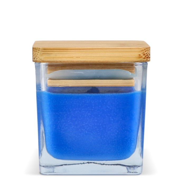 Vela de cera vegetal en tarro de cristal con tapa de bambú color azul cuarta vista Vela de cera vegetal en tarro de cristal con tapa de bambú color azul cuarta vista