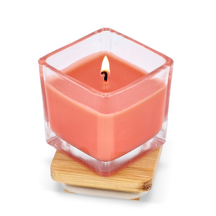 Vela de cera vegetal en tarro de cristal con tapa de bambú color naranja segunda vista Vela de cera vegetal en tarro de cristal con tapa de bambú color naranja segunda vista