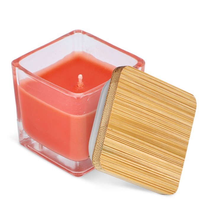 Vela de cera vegetal en tarro de cristal con tapa de bambú color naranja tercera vista Vela de cera vegetal en tarro de cristal con tapa de bambú color naranja tercera vista