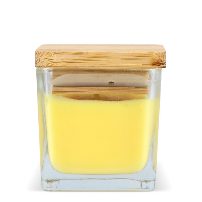 Vela de cera vegetal en tarro de cristal con tapa de bambú color amarillo cuarta vista Vela de cera vegetal en tarro de cristal con tapa de bambú color amarillo cuarta vista