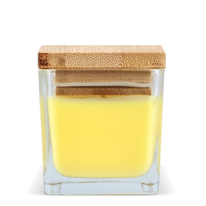 Vela de cera vegetal en tarro de cristal con tapa de bambú color amarillo quinta vista Vela de cera vegetal en tarro de cristal con tapa de bambú color amarillo quinta vista