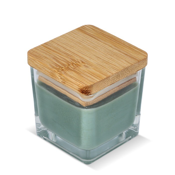 Vela de cera vegetal en tarro de cristal con tapa de bambú color verde oliva Vela de cera vegetal en tarro de cristal con tapa de bambú color verde oliva