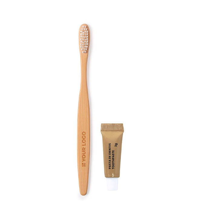 Cepillo de dientes de bambú y pasta dentífrica en caja de cartón vista principal Cepillo de dientes de bambú y pasta dentífrica en caja de cartón vista principal