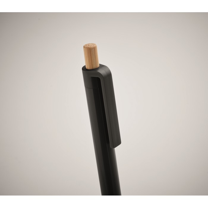 Bolígrafo monocromático con pulsador de bambú tinta azul color negro vista fotografía segunda vista