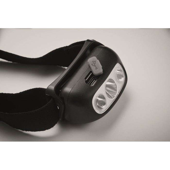 Linterna frontal recargable y ajustable con 3 modos de iluminación color negro vista fotografía quinta vista