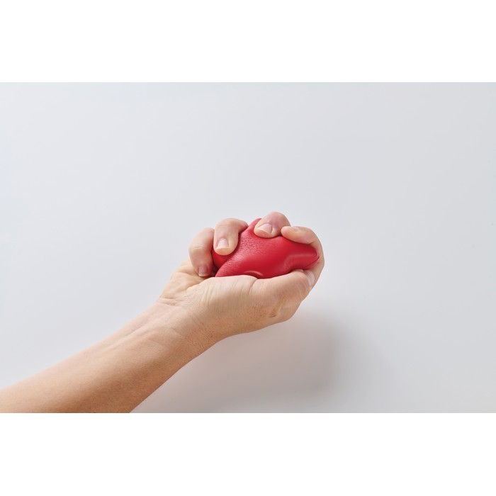 Clásica antiestrés en forma de estrella en distintos colores color rojo vista fotografía cuarta vista