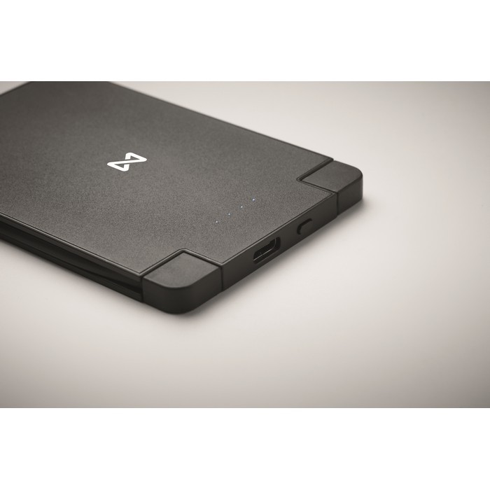 Powerbank magnética con cables incorporados en la misma 2.500 mAh color negro vista principal Powerbank magnética con cables incorporados en la misma 2.500 mAh color negro vista principal