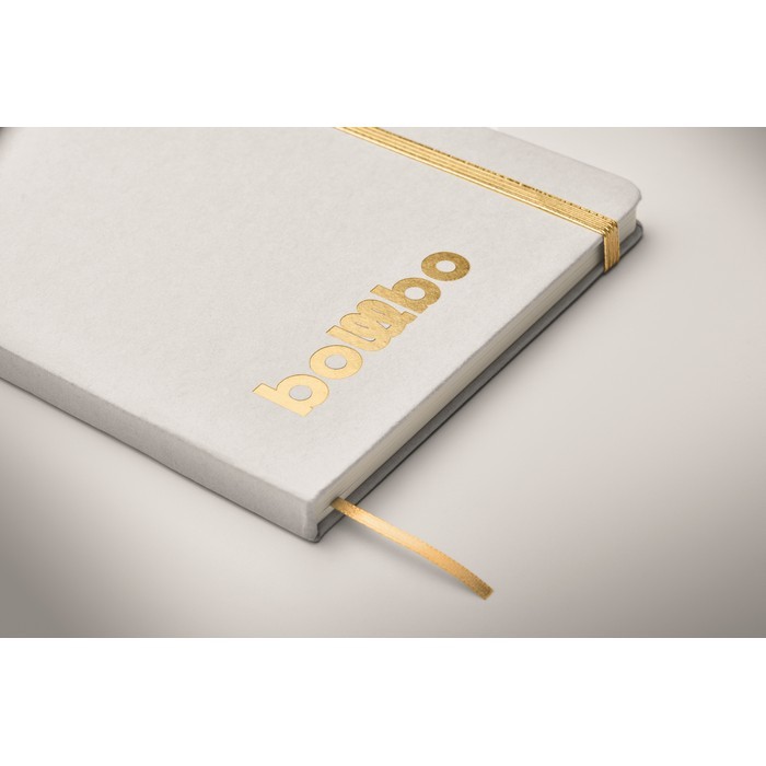 Libreta con banda elástica y marca páginas a color páginas a rayas A5 color dorado vista fotografía