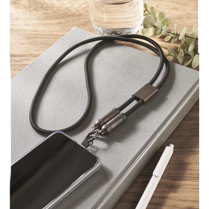 Lanyard para colgar el móvil con cable de carga incluido 60 W color negro vista bodegón Lanyard para colgar el móvil con cable de carga incluido 60 W color negro vista bodegón