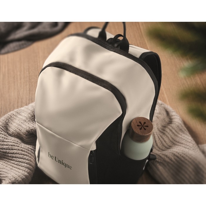 Mochila para portátil con varios bolsillos exteriores 15'' color marfil segunda vista bodegón 2