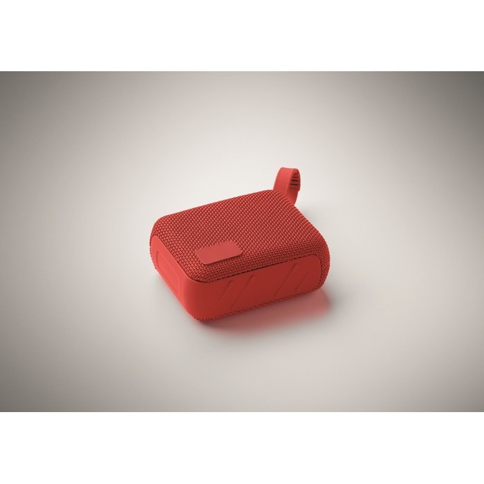 Pequeño altavoz inalámbrico con asa a juego para transporte color rojo vista fotografía quinta vista Pequeño altavoz inalámbrico con asa a juego para transporte color rojo vista fotografía quinta vista