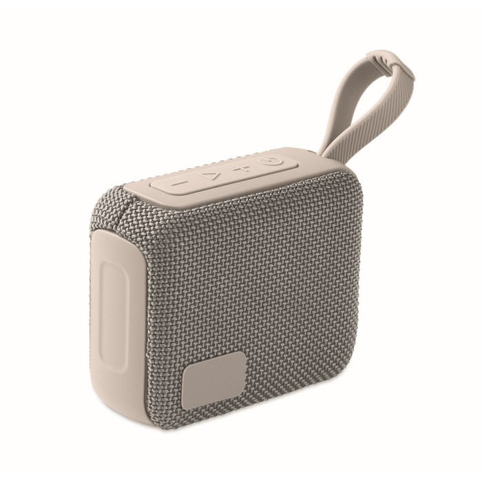 Pequeño altavoz inalámbrico con asa a juego para transporte color gris Pequeño altavoz inalámbrico con asa a juego para transporte color gris