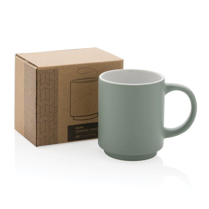 Taza de diseño disponible en varios colores color verde menta vista con en caja