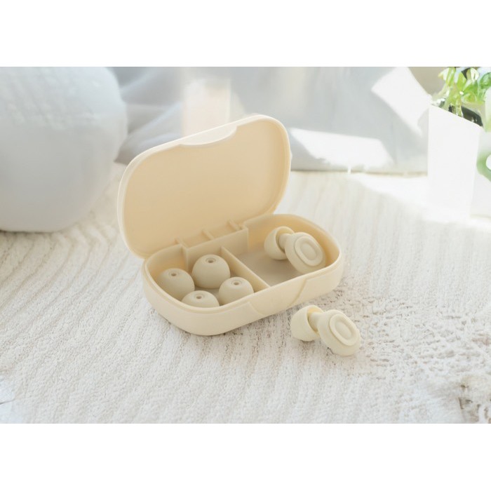 Tapones auditivos en silicona reciclada con reducción de ruido 36dB color beige vista de ambiente