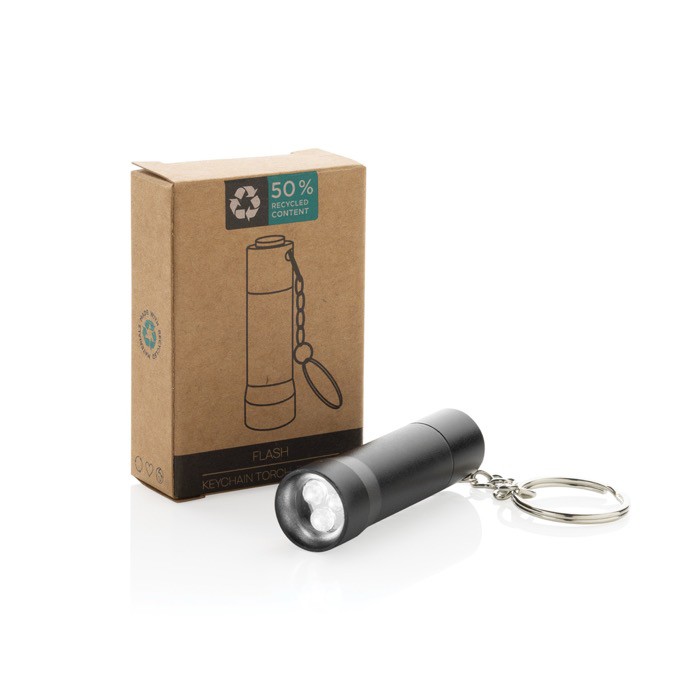 Llavero linterna de aluminio reciclado con LED y 15 lúmenes color negro vista con caja