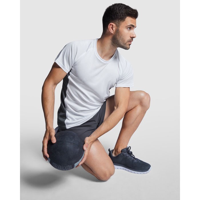 Camiseta deportiva de poliéster para hombre bicolor 140 g/m2 Roly color blanco imagen de estilo de vida