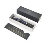 Bolígrafo bicolor con acabados metálicos color azul con caja