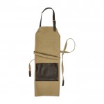 Delantal ajustable de lona con un bolsillo delantero de cuero color beige primera vista