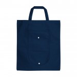 Bolsa no tejida plegable con bolsillo color azul marino segunda vista frontal