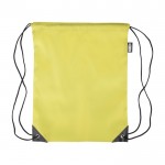 Mochila de cuerdas de poliéster con las esquinas y cuerdas negras color amarillo primera vista