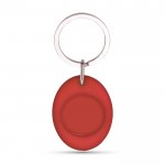 Llavero con forma ovalada que tiene moneda para carro interior color rojo