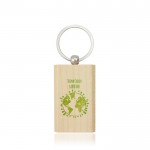 Llavero de madera con forma rectangular y anillo metálico
