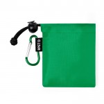 Poncho para niños en varios colores con funda de transporte color verde primera vista