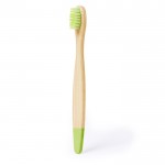 Cepillo de dientes para niños de bambú con detalles a color color verde primera vista