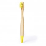 Cepillo de dientes para niños de bambú con detalles a color color amarillo primera vista