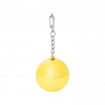 Bálsamo labial en esfera brillante con llavero mosquetón color dorado primera vista