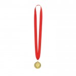 Medalla ganadora de acabado dorado con relieve en el borde color dorado primera vista