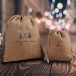 Bolsa pequeña de yute en color natural con dos cuerdas de lazos vista 10