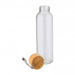 Botella con tapón de bambú y cinta color transparente tercera vista