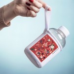 Botella con funda publicitaria