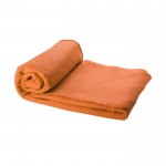 Manta de forro polar con funda color naranja