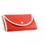 Bolsa plegable de non-woven con asas para el transporte 80 g/m2 color rojo primera vista