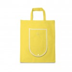 Bolsa plegable de non-woven con asas para el transporte 80 g/m2 color amarillo