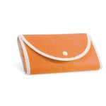 Bolsa plegable de non-woven con asas para el transporte 80 g/m2 color naranja primera vista
