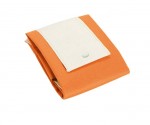 Bolsa plegable non-woven de asas cortas color naranja