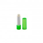 Bálsamo labial vegano con aroma de vainilla y envase transparente color verde claro primera vista