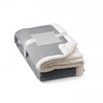 Manta en forro polar reversible color gris