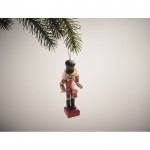Colgate navideño de madera en forma del clásico Cascanueces pequeño color rojo vista fotografía quinta vista
