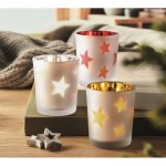 Vela luz LED en frasco de cristal con estrellitas navideñas color rojo segunda vista bodegón