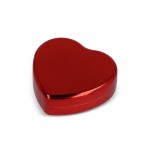 Bálsamo labial en estuche metálico en forma de corazón color rojo tercera vista