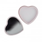Bálsamo labial en estuche metálico en forma de corazón color rojo cuarta vista