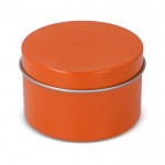 Vela de cera vegetal en tarro monocromático de acero reciclado circular color naranja