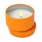Vela de cera vegetal en tarro de acero reciclado circular color naranja segunda vista