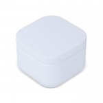 Vela de cera vegetal con aroma a vainilla en tarro de metal cuadrado color blanco