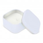 Vela de cera vegetal con aroma a vainilla en tarro de metal cuadrado color blanco tercera vista