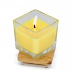 Vela de cera vegetal en tarro de cristal con tapa de bambú color amarillo segunda vista